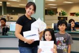 At the Lemoore West Hills College campus, Teresa Beleczar was the first in line to pick up her new Ipad.